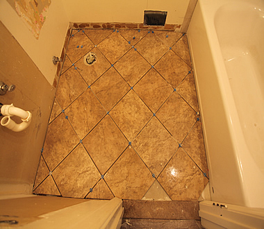 DIY diagonal bathroom tiling